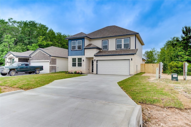 front facade with a garage and a front yard