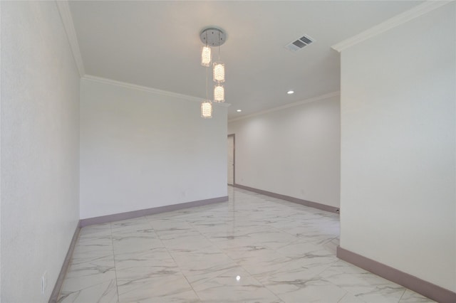 empty room featuring ornamental molding