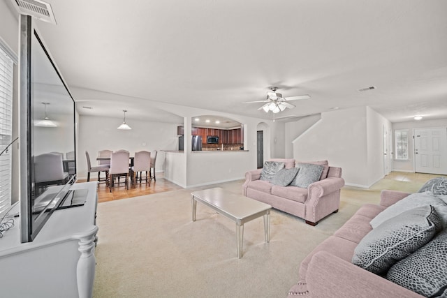 living room with ceiling fan