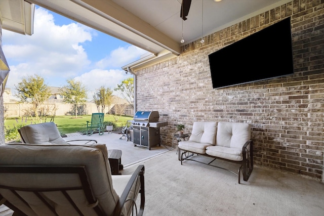 view of patio / terrace featuring a grill, an outdoor hangout area, and ceiling fan