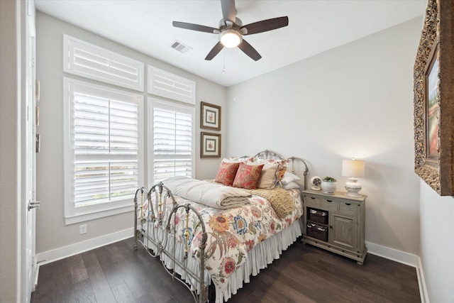 bedroom featuring ceiling fan and dark hardwood / wood-style flooring