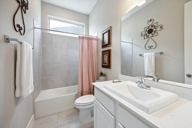 full bathroom with vanity, tile patterned floors, toilet, and shower / bath combo with shower curtain