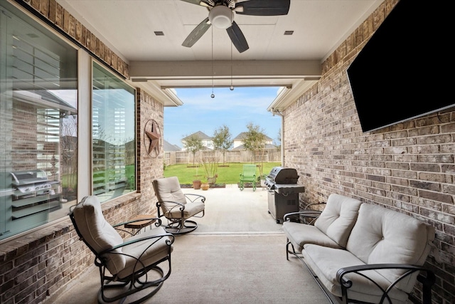 view of patio featuring ceiling fan and grilling area