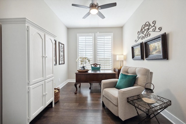 home office featuring dark hardwood / wood-style flooring and ceiling fan