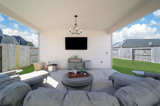 view of patio featuring a fenced backyard and an outdoor living space