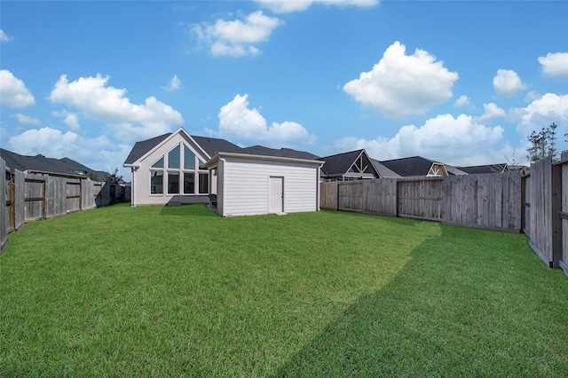 view of yard featuring a fenced backyard