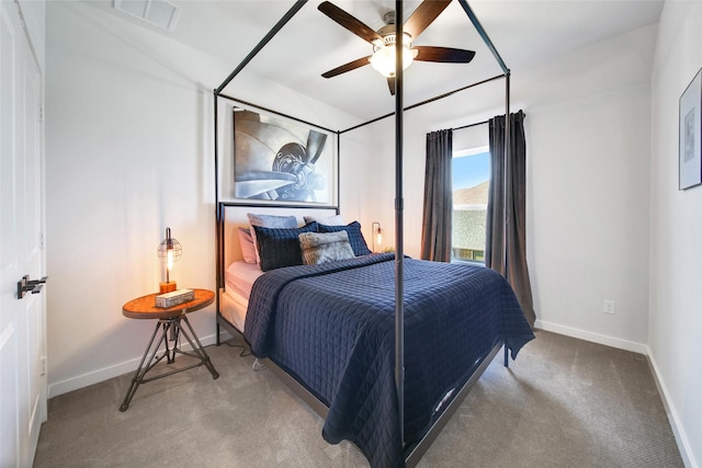 bedroom with baseboards, ceiling fan, visible vents, and light colored carpet