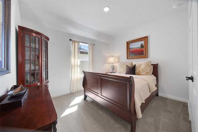 bedroom with light carpet, baseboards, and recessed lighting