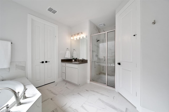 full bathroom with marble finish floor, a marble finish shower, visible vents, vanity, and a bath