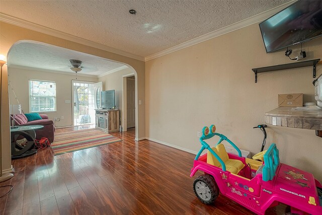 1814 Mansfield St, Houston, TX 77091 - rec room featuring hardwood / wood-style floors, crown molding, and a textured ceiling