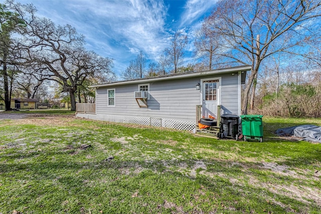 1814 Mansfield St, Houston, TX 77091 - rear view of property with cooling unit and a yard