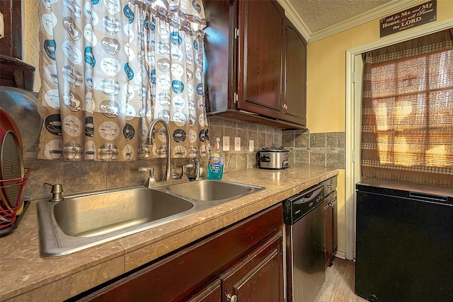 1814 Mansfield St, Houston, TX 77091 - kitchen with sink, dishwasher, tasteful backsplash, ornamental molding, and a textured ceiling