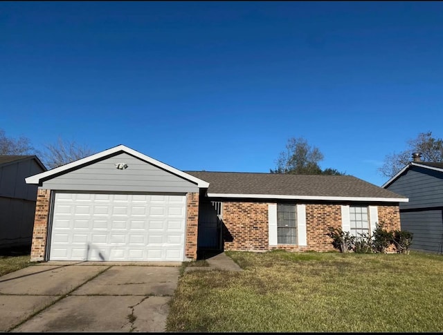 ranch-style home with a garage and a front yard