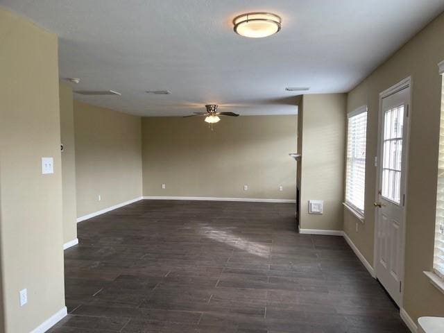 entrance foyer featuring ceiling fan and dark hardwood / wood-style floors