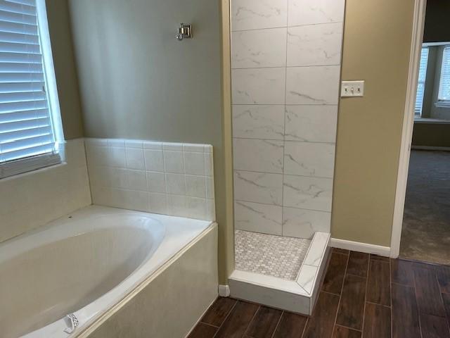 bathroom with plus walk in shower