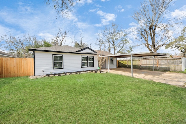 single story home with a carport and a front yard