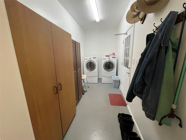 clothes washing area with laundry area and separate washer and dryer