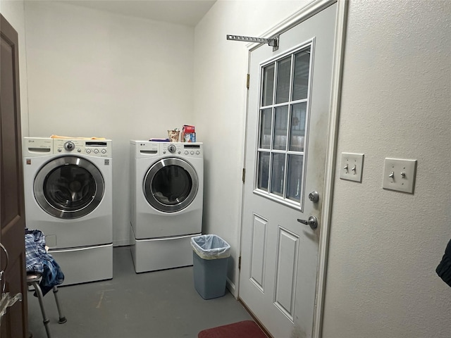 laundry room with laundry area and washer and dryer