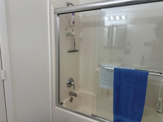 full bath with enclosed tub / shower combo