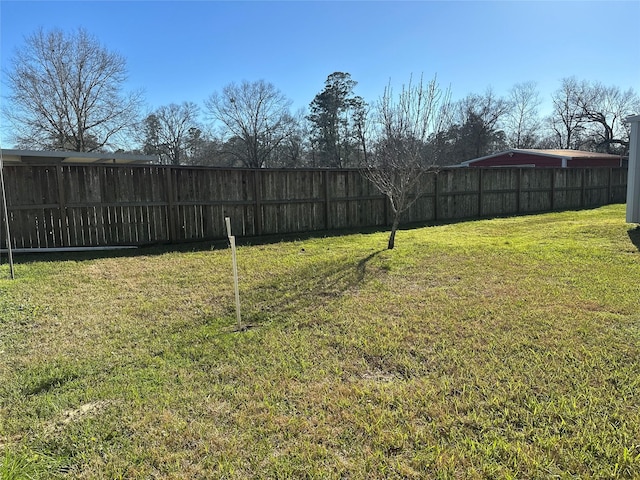 view of yard featuring a fenced backyard