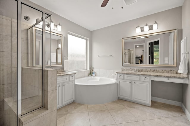 bathroom featuring ceiling fan, vanity, plus walk in shower, and tile patterned flooring