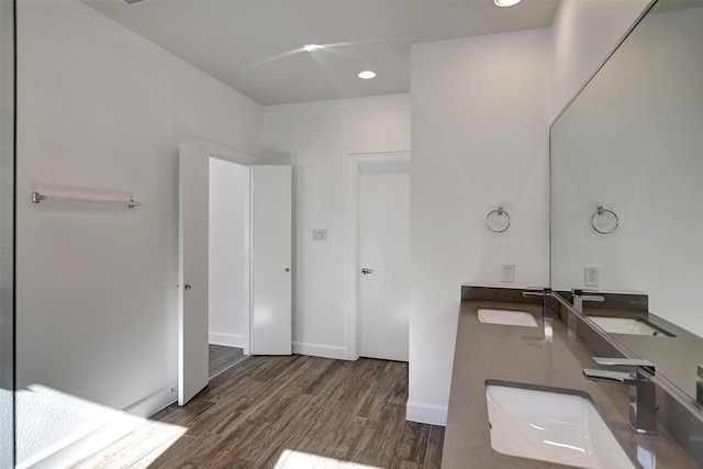 bathroom featuring vanity and hardwood / wood-style floors