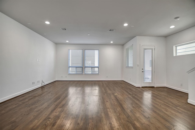 interior space with dark hardwood / wood-style flooring