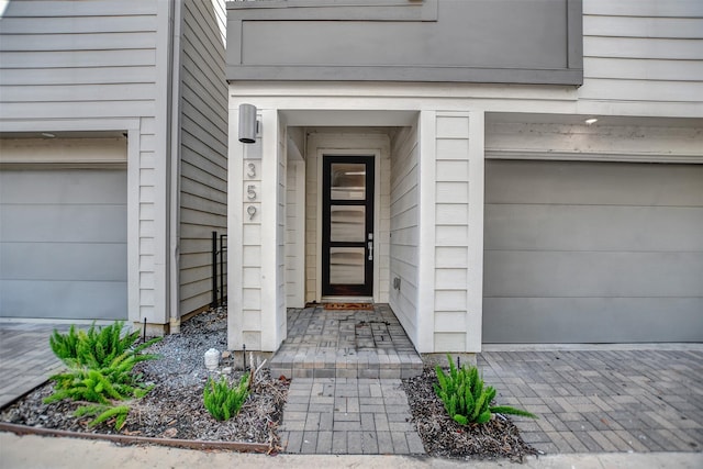 property entrance with a garage