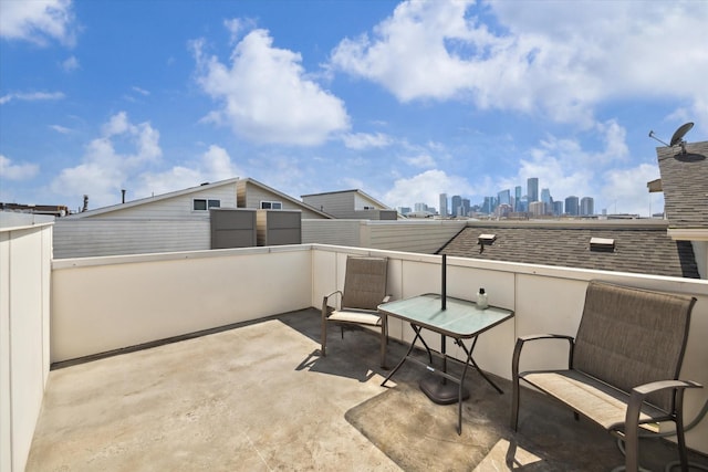 view of patio / terrace with a balcony