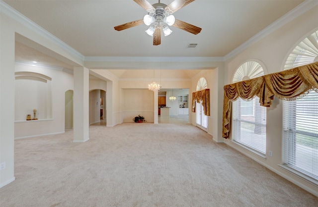 unfurnished living room featuring light carpet, crown molding, and ceiling fan with notable chandelier