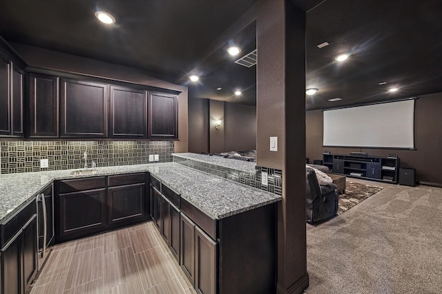 home theater with light carpet, visible vents, and recessed lighting