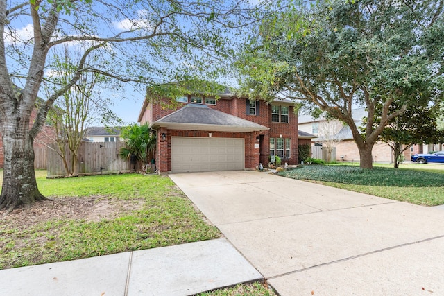 traditional-style home with a front lawn, fence, concrete driveway, an attached garage, and brick siding