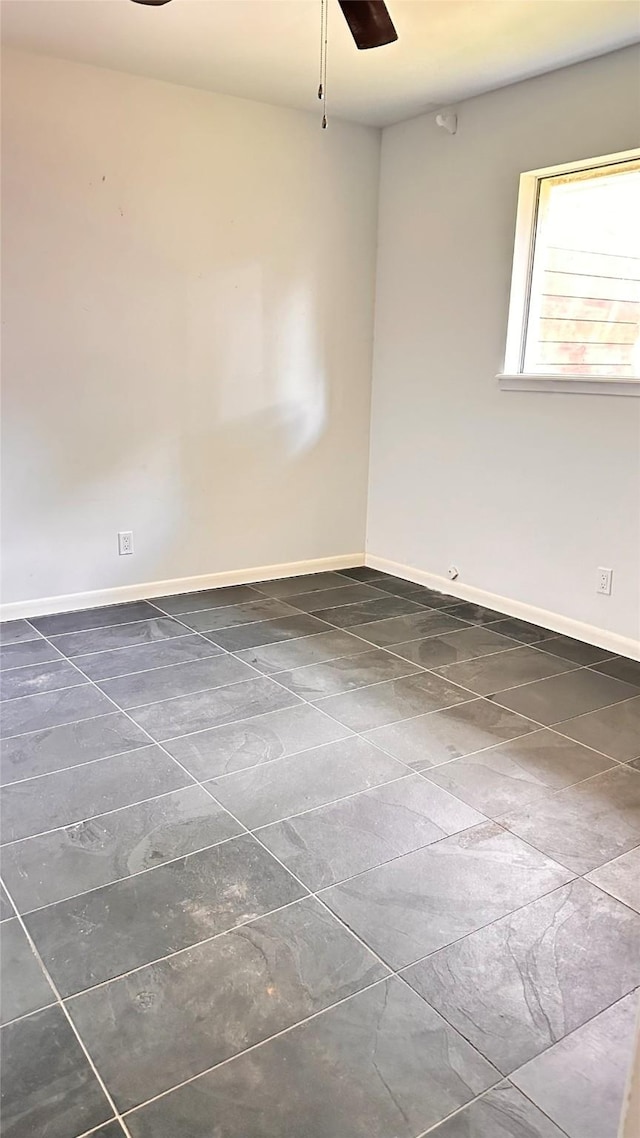 unfurnished room featuring ceiling fan