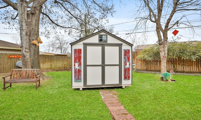 view of outbuilding with a lawn