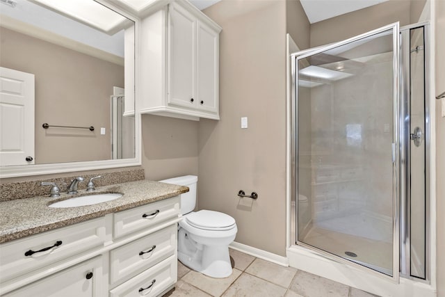 bathroom with vanity, tile patterned floors, a shower with door, and toilet