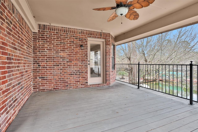 wooden deck with ceiling fan