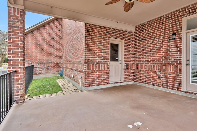 view of patio featuring ceiling fan