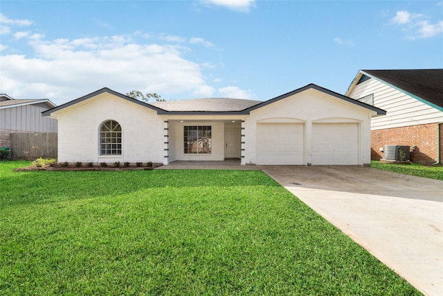 ranch-style house featuring cooling unit, a garage, and a front lawn