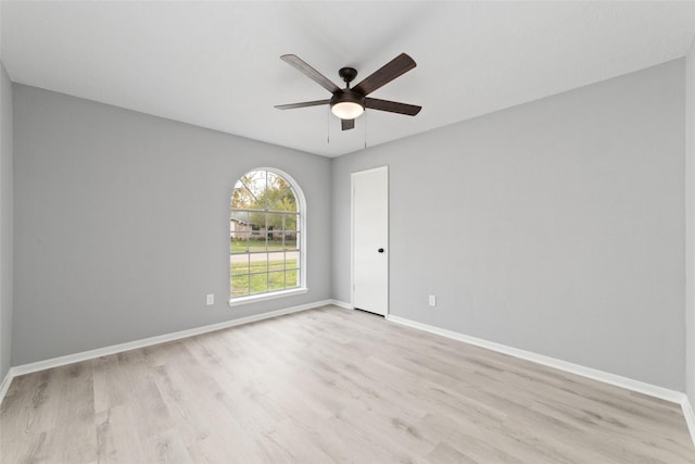 unfurnished room featuring ceiling fan and light hardwood / wood-style flooring