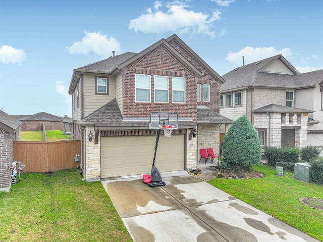 view of front facade with a garage and a front lawn