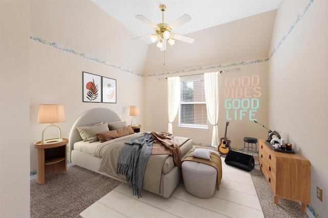 bedroom with lofted ceiling and ceiling fan