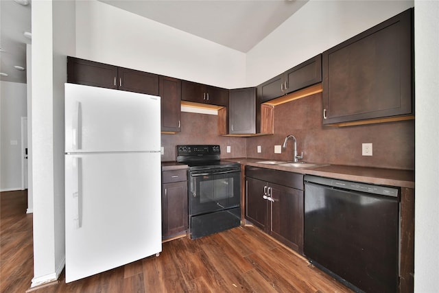 kitchen with sink, decorative backsplash, dark wood-type flooring, black appliances, and dark brown cabinets