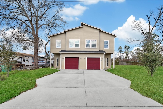 view of front facade featuring a garage and a front lawn