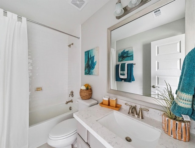 full bathroom with vanity, shower / bath combination with curtain, and toilet