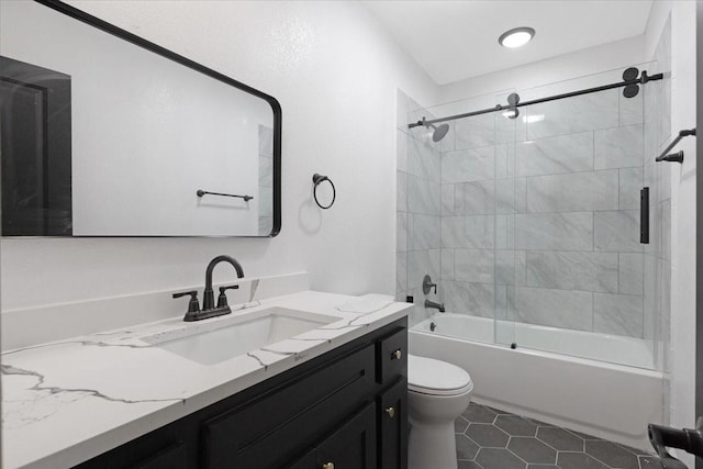 6609 Ave Q, Houston, TX 77011 - bathroom with shower / tub combination, tile patterned flooring, vanity, and toilet