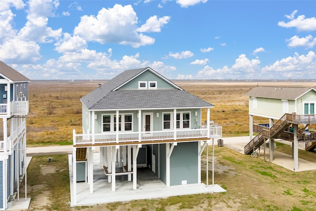 rear view of property featuring a patio