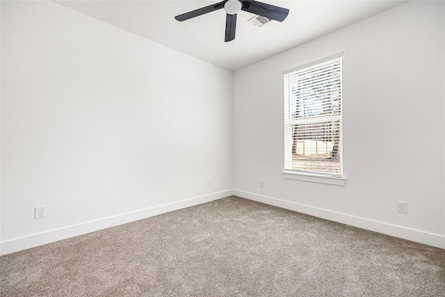 carpeted empty room with ceiling fan