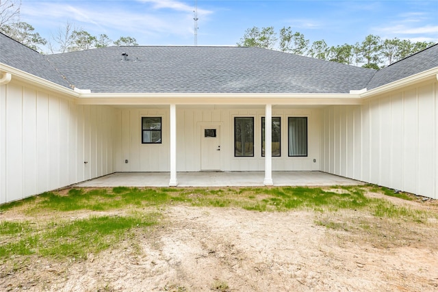 back of house with a patio