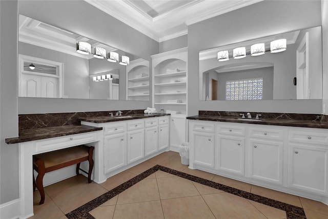 7611 Kings River Ln, Humble, TX 77346 - bathroom featuring ornamental molding, two vanities, built in features, tile patterned floors, and ceiling fan