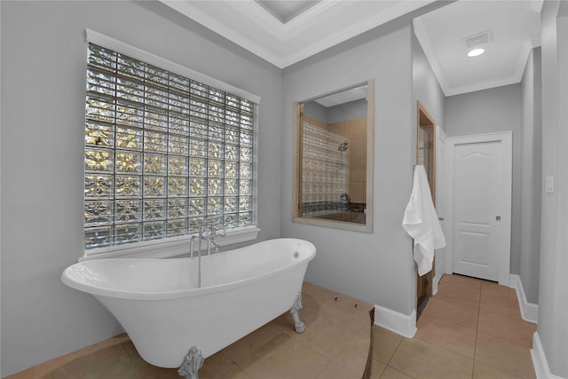 7611 Kings River Ln, Humble, TX 77346 - full bathroom featuring a soaking tub, ornamental molding, tile patterned flooring, and baseboards